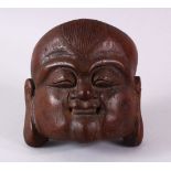 A 19TH / 20TH CENTURY CHINESE CARVED BAMBOO MASK OF BUDDHA, carved in the form of Buddha's face,