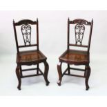 A GOOD PAIR OF CHINESE ROSEWOOD SIDE CHAIRS, the cresting rail carved with a bat and scrolls above a