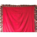 A FINE INDIAN SHAWL, the red central panel within a patchwork/embroidered border with fringe, 4ft