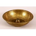 A 19TH CENTURY PERSIAN QAJAR BRASS CALLIGRAPHIC MAGIC BOWL, 15cm diameter.