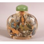 A CHINESE REVERSE PAINTED SNUFF BOTTLE - painted with immortal figures in landscapes and signed -