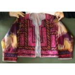 A GOOD ETHNIC MIRRORED JACKET, European, made up of Kutch and Uzbek antique pieces of geometric