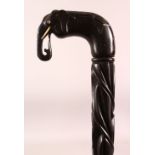 A GOOD CEYLONESE CARVED EBONY ELEPHANT HANDLE WALKING STICK - carved handle in the form of an