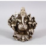 A FINE 18TH/19TH CENTURY SOUTH INDIAN WHITE METAL FIGURE OF GANESHA, 9cm high.