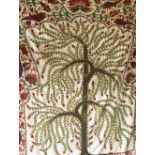 A GOOD UZBEK PRAYER ARCH, 'Tree of Life', 20th Century, green embroidered tree surrounded by a red