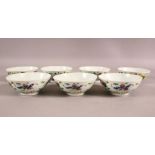 A SET OF SEVEN 19TH CENTURY CHINIESE FAMILLE ROSE PORCELAIN BOWLS - each decorated with flowers