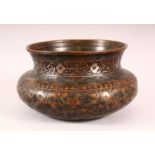 A GOOD ISLAMIC CALLIGRAPHIC TINNED COPPER BOWL, with carved calligraphy and flora, 20cm