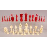 A BOX OF CHINESE FINELY CARVED IVORY CHESS PIECES, the largest piece 10cm high, the smallest 5.5cm.