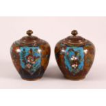 A SMALL PAIR OF CLOISONNE KORO AND COVERS, the bodies decorated insects, flowers and birds, 8cm