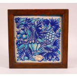 A TURKISH TURQUOISE GROUND FLORAL TILE SECTION, framed, 23cm