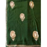 A GREEN SHAWL WITH GOLD DECORATION, 20th Century, together with a fine silk woven shawl, circa 1920,
