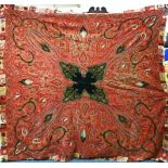 A GOOD LARGE INDIAN PAISLEY SHAWL, hand stitched with central black ground panel surrounded by