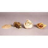 A CARVED IVORY NETSUKE DEPICTING A BOAR, along with another of a snail, an amusing netsuke and a