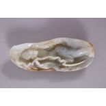 A GOOD CHINESE JADE CARVING, possibly of an immortal, 13cm x 5cm.