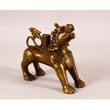 A RARE 16TH/17TH CENTURY TIBETAN OR NEPALESE BRONZE STANDING LION, possibly an incense holder,