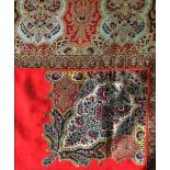 A EUROPEAN RED SILK SQUARE PAISLEY SHAWL, part mid 19th Century with later tassel and corner