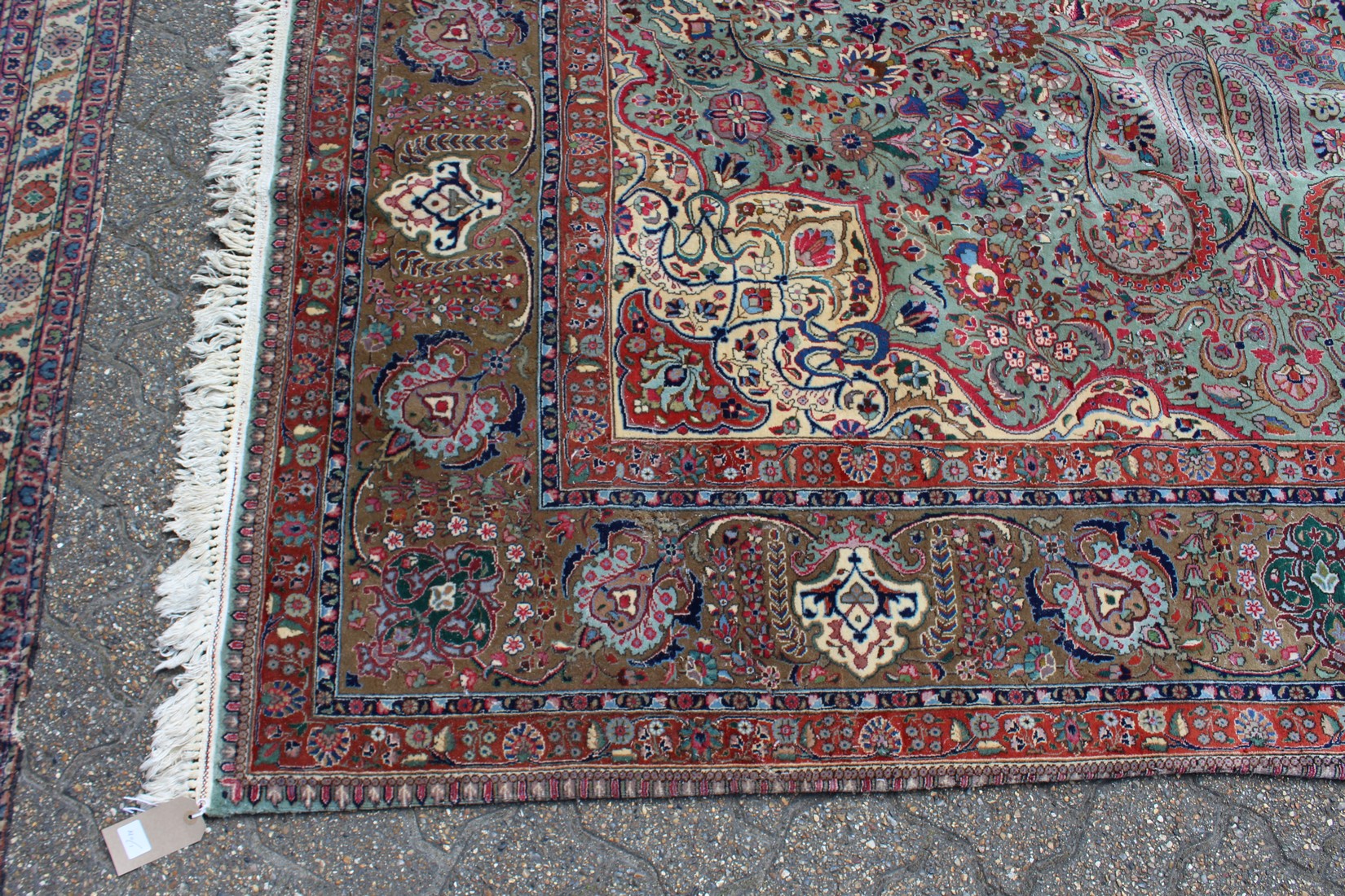 A LARGE PERSIAN TABRIZ CARPET, pale green ground with all over stylised floral decoration within a - Image 3 of 5