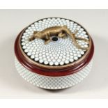 A CONTINENTAL PORCELAIN CIRCULAR BOX AND COVER, the top with a lizard. 5 ins diameter.
