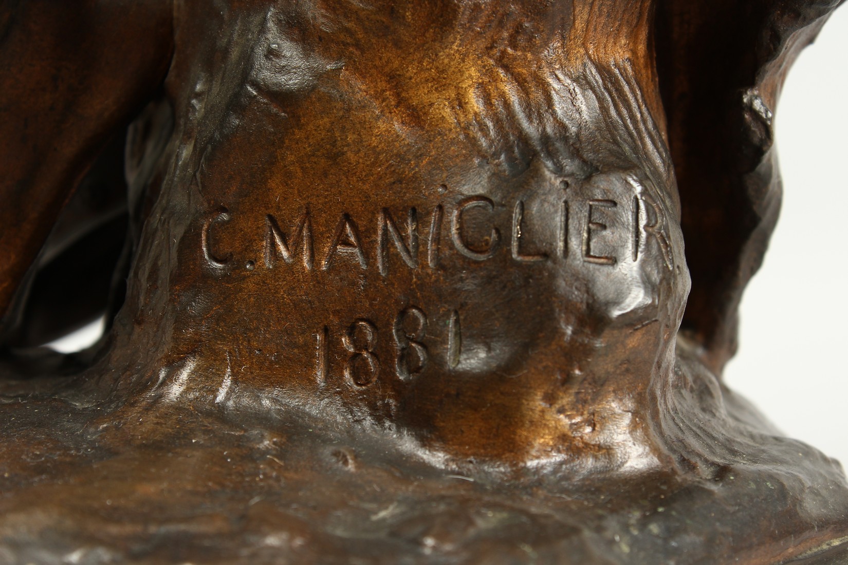 C. MANICLIER. A LARGE BRONZE OF A YOUNG MAN, seated on a tree stump with octagonal base. Signed - Image 15 of 18