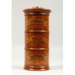 A THREE TIER SPICE HOLDER, GINGER, MACE AND NUTMEG. 8ins high