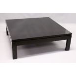 A LARGE EBONISED COFFEE TABLE, 20TH CENTURY, on square legs. 3ft 11.5ins x 3ft 11.5ins x 1ft 4ins.