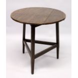 AN 18TH CENTURY STYLE CRICKET TABLE , the circular top supported on three square legs united by