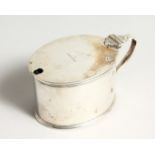 AN OVAL SILVER MUSTARD POT with sapphire blue liner. London 1898