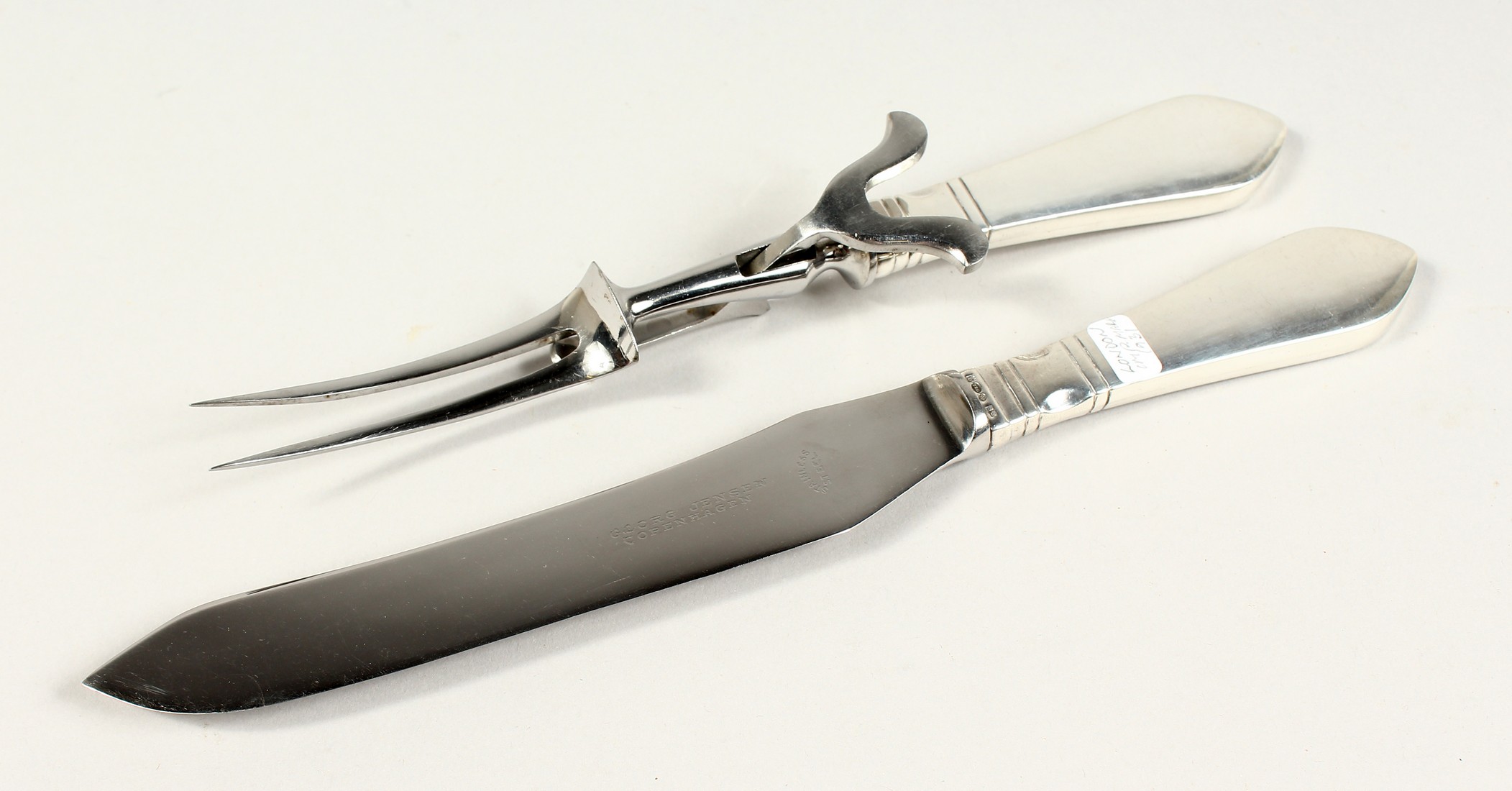 A GEORG JENSEN OLD CLASSIC SILVER HANDLED CARVING SET.