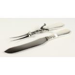 A GEORG JENSEN OLD CLASSIC SILVER HANDLED CARVING SET.