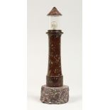 A CORNISH CARVED SERPENTINE LIGHTHOUSE FORM TABLE LAMP 11ins high.