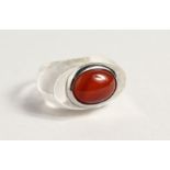 A RED STONE DESIGNER RING