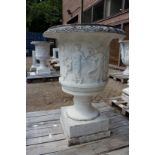 A VERY GOOD PAIR OF ITALIAN CARVED WHITE MARBLE TWO HANDLED URNS, the sides carved with figures