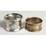 A SILVER AND ENAMEL MASONIC SERVIETTE RING ST JOHNS LODGE 1030 and a small plain serviette ring