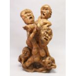 A LARGE UNUSUAL CHINESE ROOTWOOD SCULPTURE OF A MOTHER, FATHER AND THREE CHILDREN, all with