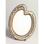 A GOOD MOSIAC FRAMED SHAPED EASEL MIRROR with a band of flowers 13.5ins high.