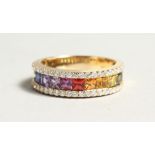 AN 18CT. YELLOW GOLD AND MULTI-COLOURED NATURAL SAPPHIRE RING. Size P