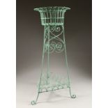 A WIREWORK PLANTER 34ins high.