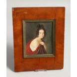 A 19TH CENTURY PORTRAIT MINIATURE OF A YOUNG LADY 4.5ins x 3.5ins in a wooden frame