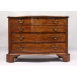 A GEORGE III DESIGN SERPENTINE FRONTED MAHOGANY COMMODE with four graduated long drawers, fluted