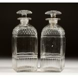 A PAIR OF CUT GLASS SQUARE SHAPED DECANTERS 7ins high