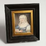 A 19TH CENTURY PORTRAIT MINIATURE OF A LADY with long curly hair 3.75in x 3ins in a gilt and