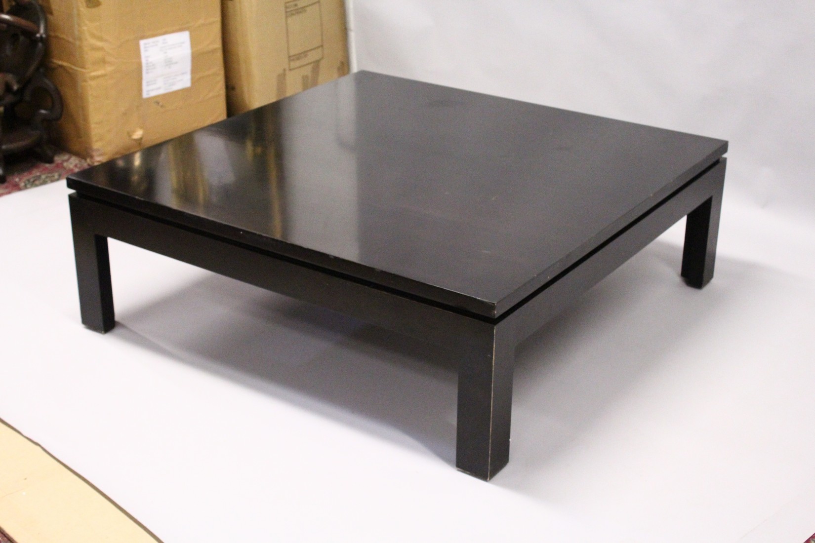 A LARGE EBONISED COFFEE TABLE, 20TH CENTURY, on square legs. 3ft 11.5ins x 3ft 11.5ins x 1ft 4ins. - Image 3 of 3