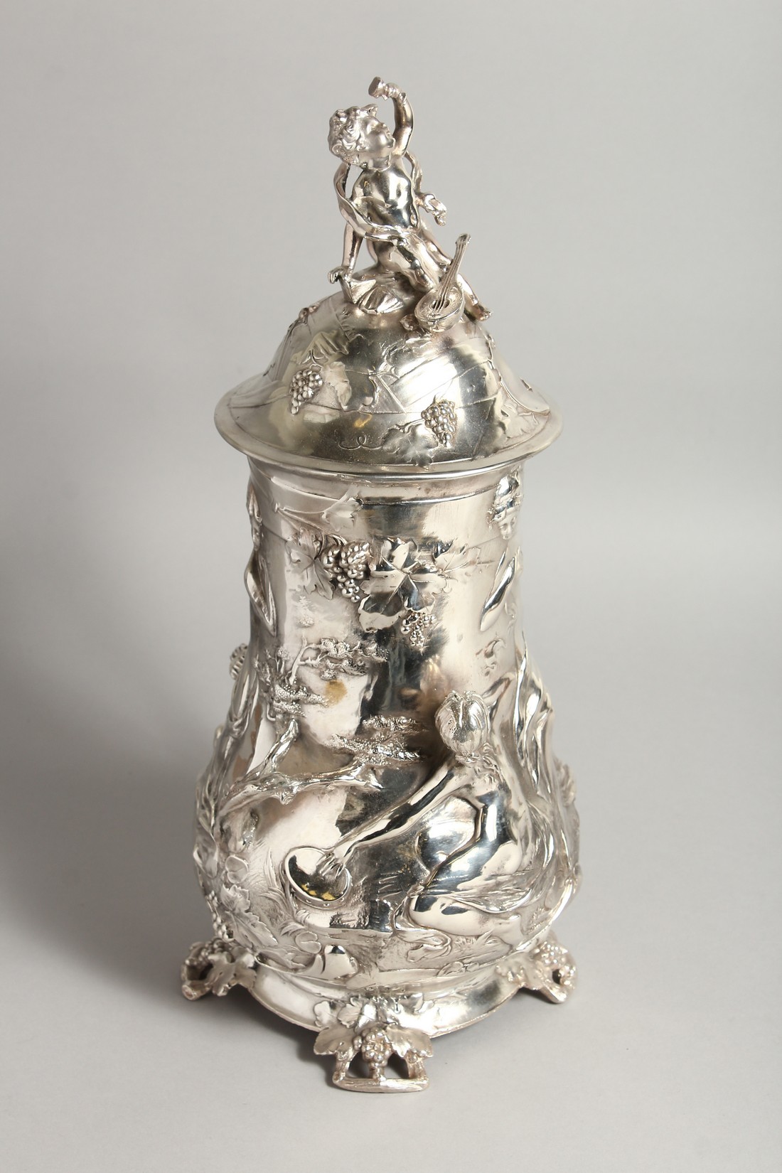 A GOOD W.M.F PLAIN TANKARD covered with classical repousse decoration. 16ins high. - Image 2 of 6