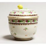 A VIENNA PORCELAIN BOWL AND COVER, apple finial. Beehive mark in puce, No. 24 4.5ins high.