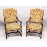 A GOOD PAIR OF 17TH CENTURY DESIGN WALNUT OPEN ARMCHAIRS, with needlework upholstered backs and
