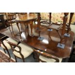 A GOOD GEORGE III DESIGN MAHOGANY TWIN PILLAR DINING TABLE with loose leaf. 6ft 6ins long, 3ft