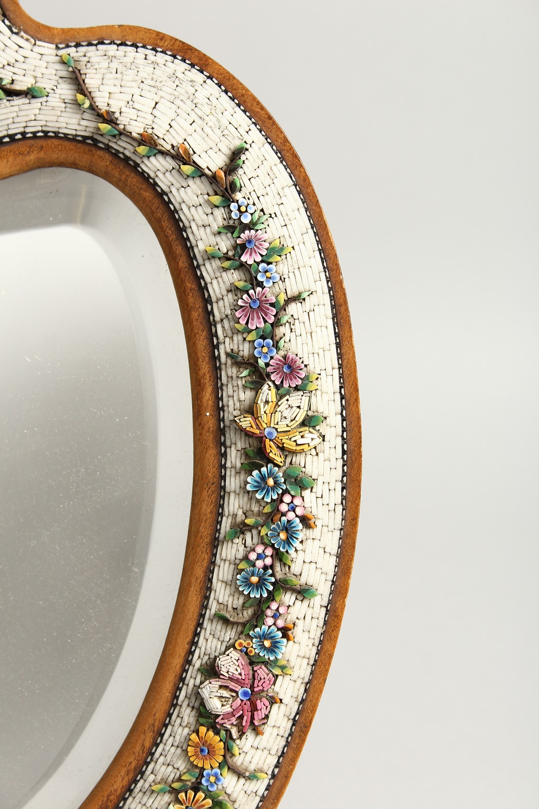 A GOOD MOSIAC FRAMED SHAPED EASEL MIRROR with a band of flowers 13.5ins high. - Image 6 of 8