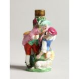 A SMALL SAMSON OF PARIS PORCELAIN SCENT BOTTLE, young lovers and a lamb. 2.5ins high.