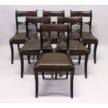 A GOOD SET OF SIX REGENCY MAHOGANY DINING CHAIRS, reeded frames, sabre legs and drop in seats