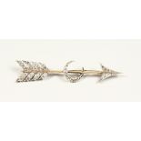 A LARGE DECORATIVE ARROW AND CRESCENT BROOCH 4ins long